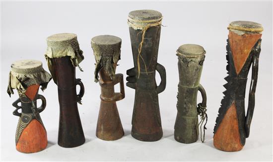 Six Kundu wooden hand drums, various